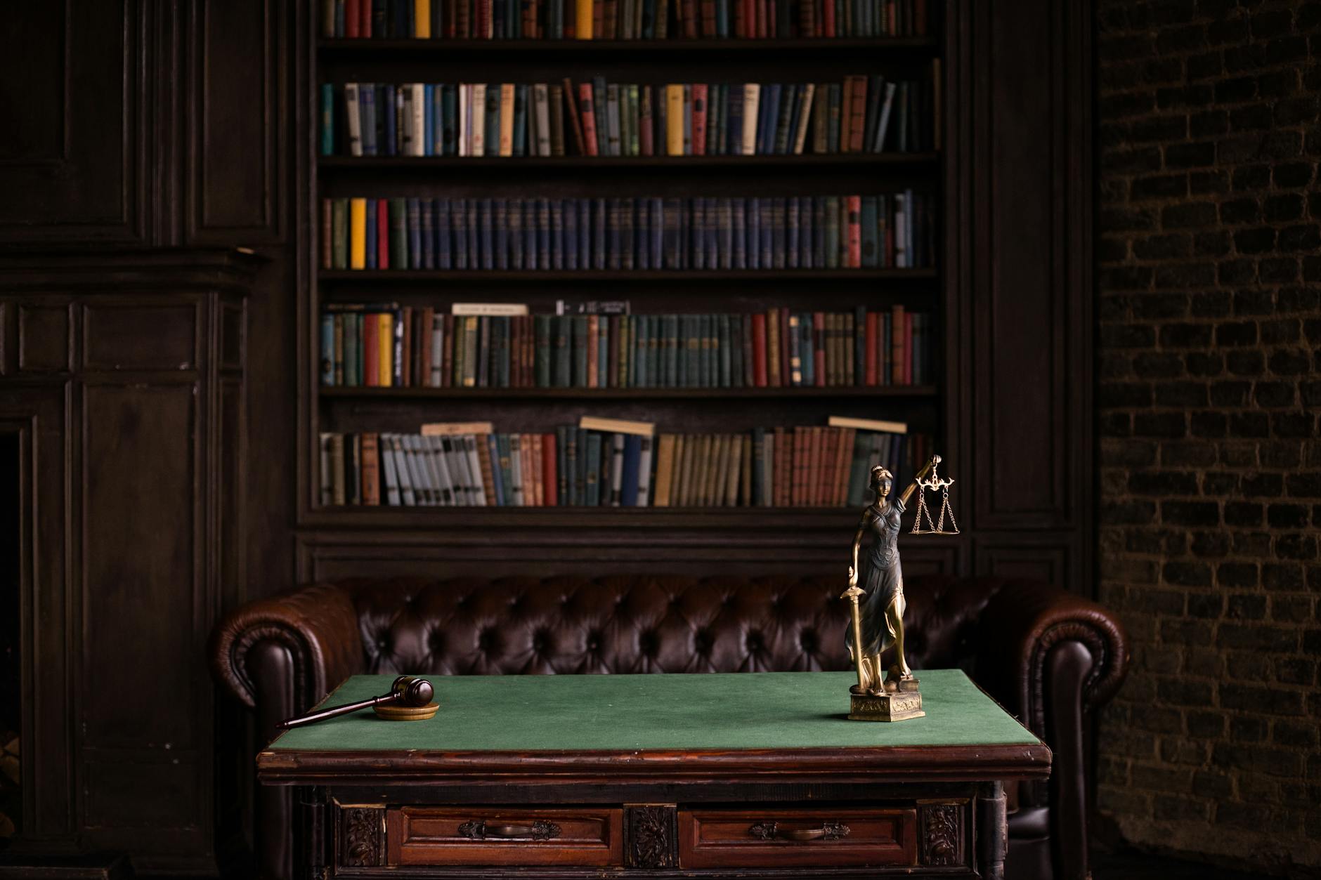 Law library with dark wood shelving and rows of legal reference volumes